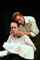 James consoles his wife (James) before callously leaving her